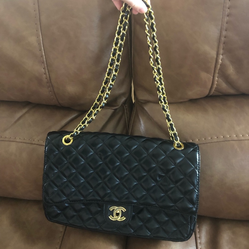 Black quilted bag with chain handles
